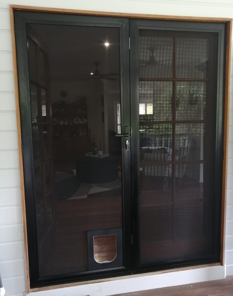 double hinged entry doors with pet door