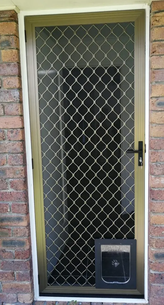 hinged security door with bronze frame and diamond grille